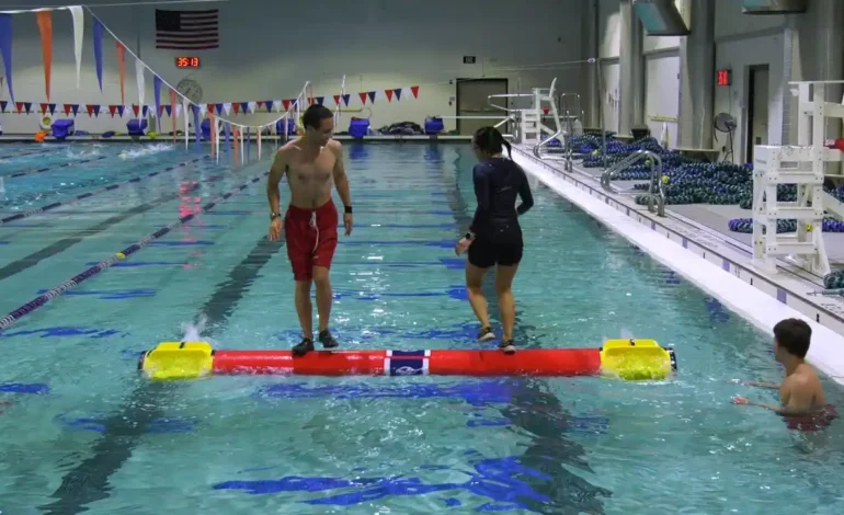 Blue and Yellow Log Roller in the Pool: Your Next Big Splash of Fun